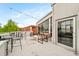 Wide shot of rooftop deck with tables, chairs, cafe lights, and building features at 572 Edgewood Se Ave # 303, Atlanta, GA 30312