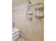 The bathroom features a tiled shower and tub with a handheld shower head at 572 Edgewood Se Ave # 303, Atlanta, GA 30312