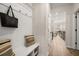 Functional entryway with built-in storage bench, hooks, and convenient access to the kitchen at 106 Jacobs Farm Ln # 42, Lawrenceville, GA 30045