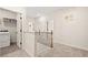 Upstairs hallway leads to bedrooms, closets, and the laundry room at 106 Jacobs Farm Ln # 42, Lawrenceville, GA 30045