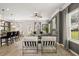 Open-concept living room showcasing stylish furniture, fireplace, and natural light from large windows at 106 Jacobs Farm Ln # 42, Lawrenceville, GA 30045