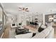Open concept view of living room, dining area, and kitchen with modern design and finishes at 106 Jacobs Farm Ln # 42, Lawrenceville, GA 30045