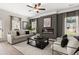 Cozy living room featuring a plush sofa, contemporary fireplace, and neutral color palette at 106 Jacobs Farm Ln # 42, Lawrenceville, GA 30045