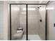 Contemporary shower with tile surround, built-in bench, and glass enclosure at 106 Jacobs Farm Ln # 42, Lawrenceville, GA 30045