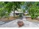 An exterior view of a well-maintained backyard and patio, with a view of the house at 1228 Hosea L Williams Ne Dr, Atlanta, GA 30317