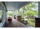Relax on the covered front porch with views of the beautifully landscaped yard at 1228 Hosea L Williams Ne Dr, Atlanta, GA 30317