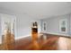 Bright living room featuring beautiful hardwood floors and neutral paint at 1228 Hosea L Williams Ne Dr, Atlanta, GA 30317