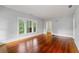Bright living room featuring beautiful hardwood floors and neutral paint at 1228 Hosea L Williams Ne Dr, Atlanta, GA 30317