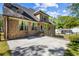 Brick home exterior with outdoor patio perfect for entertaining at 1614 Rucker Rd, Alpharetta, GA 30009