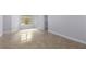 Cozy bedroom featuring bright neutral paint and glossy tile flooring at 1614 Rucker Rd, Alpharetta, GA 30009