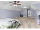 Spacious bedroom featuring a ceiling fan, plush carpet, and large area for furniture at 1614 Rucker Rd, Alpharetta, GA 30009