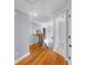 Hallway with hardwood floors, stairs and doorways at 1614 Rucker Rd, Alpharetta, GA 30009