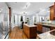 Open kitchen featuring granite counters, stainless steel appliances and breakfast area at 1614 Rucker Rd, Alpharetta, GA 30009