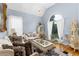 Cozy living room features hardwood floors, high ceilings, and natural lighting at 1614 Rucker Rd, Alpharetta, GA 30009