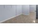 This walk-in closet is equipped with rods and shelving, providing extensive storage solutions at 1614 Rucker Rd, Alpharetta, GA 30009