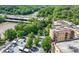 Aerial shot capturing condo buildings, a river, and a highway for accessible community and scenic views at 200 River Vista Dr # 120, Atlanta, GA 30339