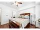 Cozy bedroom with a ceiling fan, hardwood floors, and an ample natural light at 200 River Vista Dr # 120, Atlanta, GA 30339