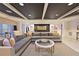A well-lit resident lounge with contemporary furnishings, stylish decor, and sleek flooring at 200 River Vista Dr # 120, Atlanta, GA 30339