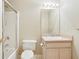 Bathroom featuring a vanity, mirror, and shower and tub combination at 259 Pine Valley Dr, Powder Springs, GA 30127