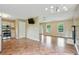 Open floor plan featuring a kitchen and living room area with lots of natural light at 259 Pine Valley Dr, Powder Springs, GA 30127
