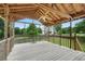 Large screened in patio with a view of the backyard at 259 Pine Valley Dr, Powder Springs, GA 30127