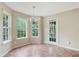 A sunroom featuring many large windows and natural lighting at 259 Pine Valley Dr, Powder Springs, GA 30127