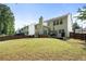 Rear exterior with deck, patio, hot tub, and spacious backyard at 4321 Sugar Maple Chase Nw, Acworth, GA 30101