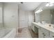 Bright bathroom with soaking tub, dual sinks, and vanity area at 4321 Sugar Maple Chase Nw, Acworth, GA 30101
