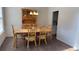 Traditional dining room with hardwood floors, wooden table and chairs, and a hutch at 4321 Sugar Maple Chase Nw, Acworth, GA 30101