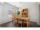 Cozy dining room with a wooden table, chairs, and plenty of natural light at 4321 Sugar Maple Chase Nw, Acworth, GA 30101