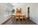 Formal dining room with wood floors, wainscoting, and a classic chandelier at 4321 Sugar Maple Chase Nw, Acworth, GA 30101