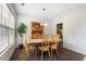 Dining area featuring wood floors, a charming hutch, and natural light at 4321 Sugar Maple Chase Nw, Acworth, GA 30101