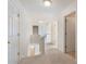 Upstairs hallway features neutral walls, plush carpeting and access to multiple bedrooms at 4321 Sugar Maple Chase Nw, Acworth, GA 30101