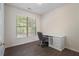 Bright home office with wood floors, a large window and a desk with a chair at 4321 Sugar Maple Chase Nw, Acworth, GA 30101
