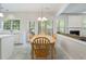 Eat-in kitchen area with access to the backyard, with lots of natural light and stainless steel appliances at 4321 Sugar Maple Chase Nw, Acworth, GA 30101