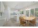 Eat-in kitchen with stainless steel appliances, a center island, and a dining area with lots of natural light at 4321 Sugar Maple Chase Nw, Acworth, GA 30101
