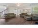 Inviting living room with hardwood floors and lots of natural light coming through the windows at 4321 Sugar Maple Chase Nw, Acworth, GA 30101