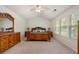 This main bedroom features a vaulted ceiling and natural light from large windows at 4321 Sugar Maple Chase Nw, Acworth, GA 30101