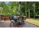 Outdoor patio with table, chairs, and grill at 4321 Sugar Maple Chase Nw, Acworth, GA 30101