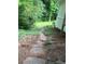A stone path leads into the private backyard at 4717 Westhampton Dr, Tucker, GA 30084