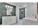 Modern bathroom featuring dual vanities, gold fixtures, and walk-in shower with teal tile at 4717 Westhampton Dr, Tucker, GA 30084