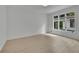 Bright bedroom showcases views of the yard and home at 4717 Westhampton Dr, Tucker, GA 30084
