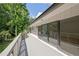 Spacious deck with sliding glass doors overlooks a lush, green yard at 4717 Westhampton Dr, Tucker, GA 30084