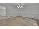 Spacious living room features neutral walls, modern lighting, and elegant trim work at 4717 Westhampton Dr, Tucker, GA 30084