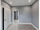 Neutral bedroom featuring plush carpet, recessed lighting, and white trim and doors at 629 Windsor Sw St, Atlanta, GA 30312