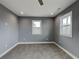 Bedroom showcasing plush carpet, recessed lighting, and natural light from the windows at 629 Windsor Sw St, Atlanta, GA 30312