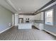 Modern kitchen features white cabinets, granite countertops, and stainless steel appliances at 629 Windsor Sw St, Atlanta, GA 30312