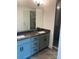 Modern bathroom with double vanity, sleek fixtures, and glass-enclosed shower at 115 Pinecone Pkwy, Alpharetta, GA 30022