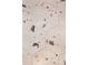 Close-up showcases stylish terrazzo flooring in a bathroom, adding texture and character to the space at 174 Zelma Sw St, Marietta, GA 30060
