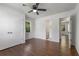 Spacious bedroom features hardwood floors, ceiling fan, and ensuite bathroom at 174 Zelma Sw St, Marietta, GA 30060